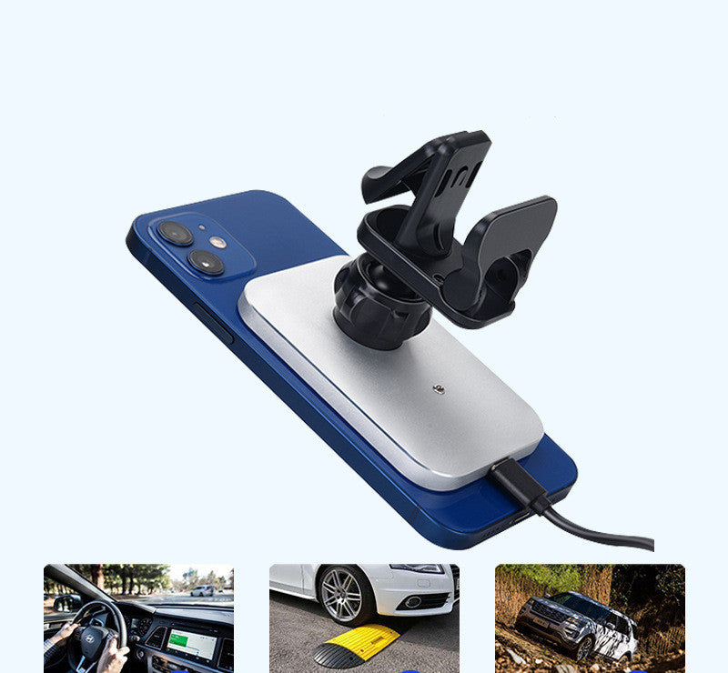 Magnetic wireless charging car phone holder on dashboard